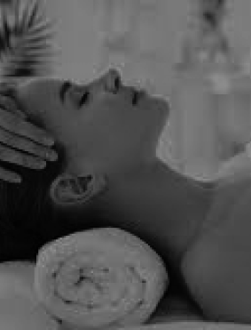 Woman on massage bed relaxing at an ITR session